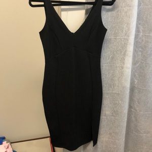 Bodycon black dress.